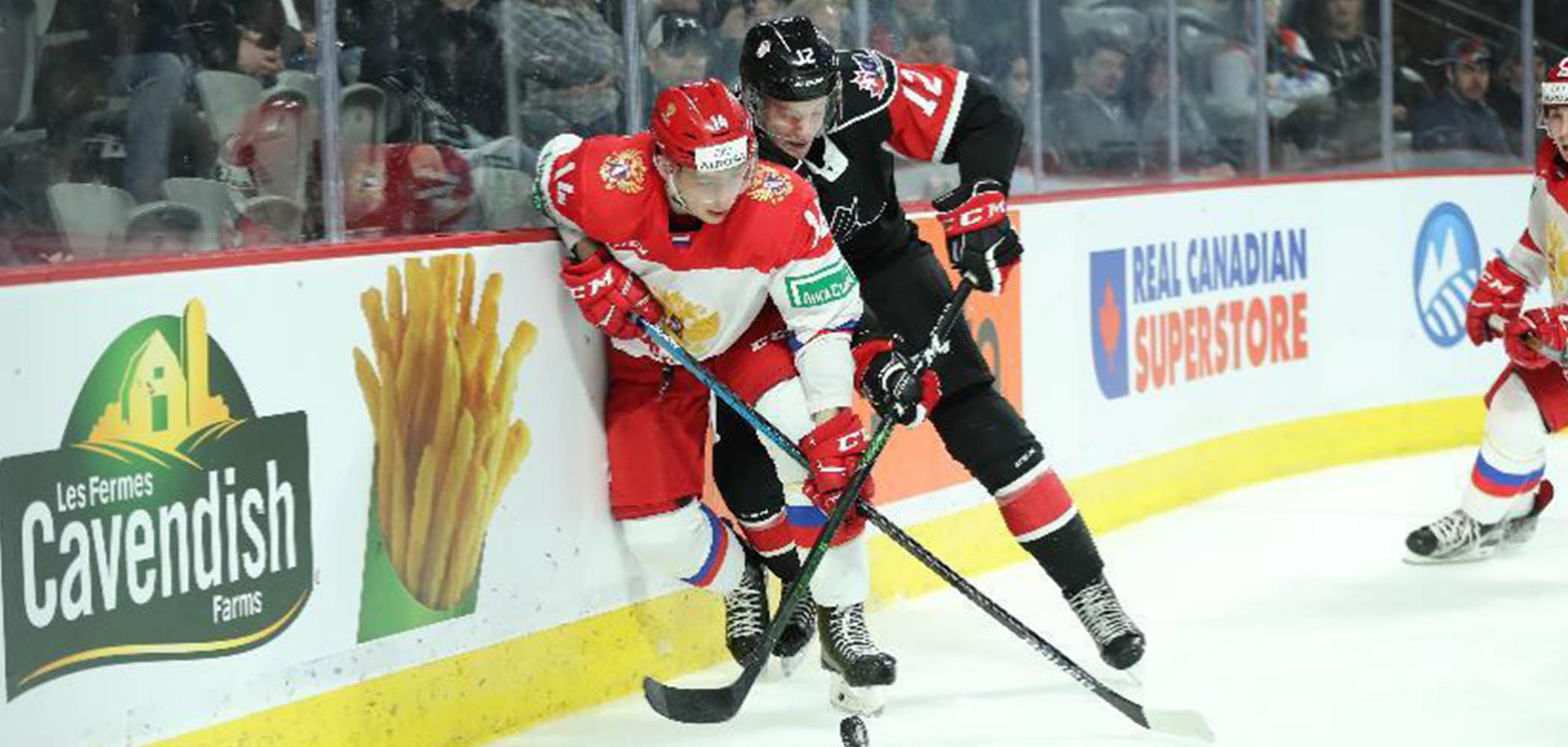 Snapshot of a hockey match in the Canada Russia Series sponsored by Cavendish Farms